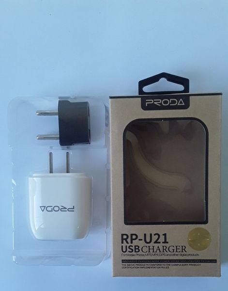 Мережевий зарядний пристрій Proda RP-U21 Flat 2.1A 2USB 220V вилка Тип А білий плюс перехідник євровилка (EU) 2000700012554 фото